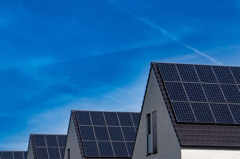 solar panels installed on a residential roof with sizing diagram