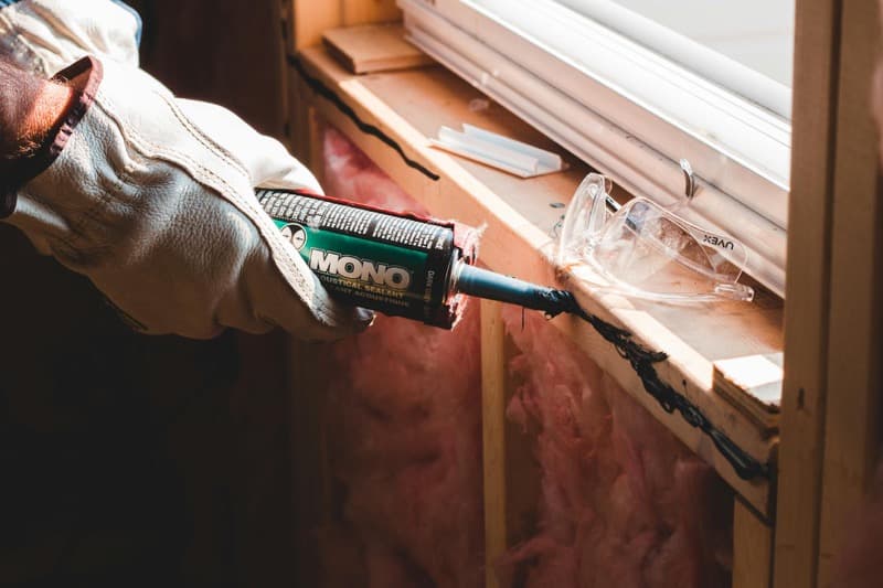 homeowner reviewing IRA window tax credit documents